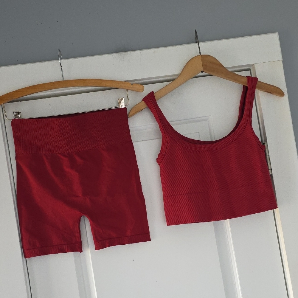 Nikibiki Ribbed Scoop Tank and High-Waist Bike Shorts Set in Deep Cherry Red.